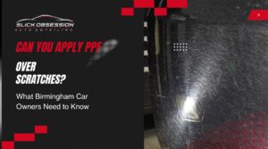 Graphic from Slick Obsession Auto Detailing asking Can you apply PPF over scratches with a close up of a black car panel covered in swirl marks and surface scratches under bright light. The image highlights paint damage that Birmingham car owners may want to protect with paint protection film.